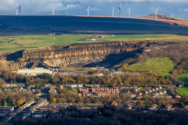 view of quarry and town  from hill in Holcombe - Greater Manchester - Lancashire - United Kingdom clipart