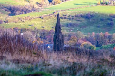 beautiful view of the church on hill in Holcombe - Greater Manchester - Lancashire - United Kingdom clipart