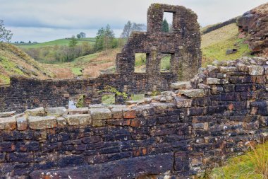 ruins of a old building -lumb mill in Cheesden Valley - Rochdale - Greater Manchester - Lancashire - United Kingdom clipart