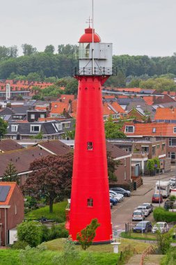 town and red light house in Hoek van Holland - Rotterdam - Netherlands - European Union clipart