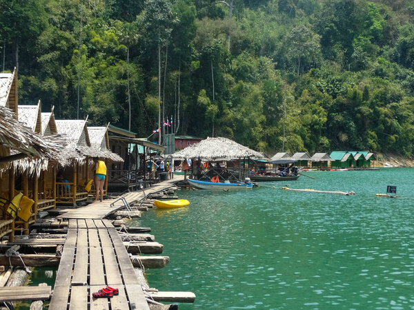 A picturesque village built on water in Khao Sok National Park, Thailand. The stilt houses reflect the harmony between nature and local life.