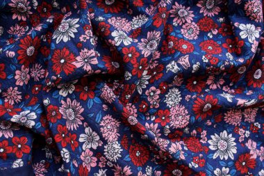 doku arka planı, kumaş deseni, kırmızı mavi. kırmızı çiçek izi.