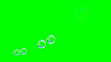 Siyah arkaplanda izole edilmiş yeşil baloncuklar