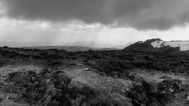 Storm Cloud Skies in the Absaroka Beartooth Mountains Montana clipart