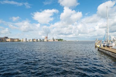 skyline of city of aalborg in Denmark on a sunny summer day clipart