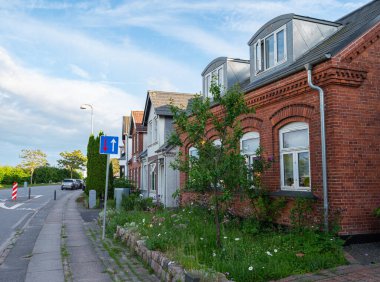 Suburbs of city of Odense in Denmark on a sunny summer day clipart