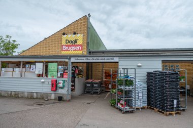 Mon Denmark - May 29. 2024: The supermarket of town of Borre clipart