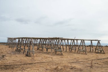 Fish drying racks in Akranes in west Iceland clipart