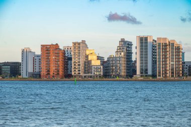 Beautiful skyline of city of Aalborg in Denmark on a summer day clipart