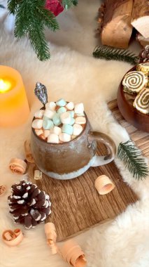 Cozy holiday scene captures essence of an alpine chalet with rich wood textures, a warm candle glow, cocoa, and pastries nestled among pine cones. Touches of greenery evoke serene mountain ambiance. clipart