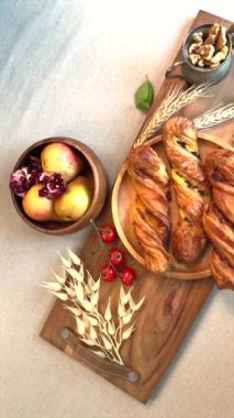Yumuşak hamur işleri, olgun armutlar ve fesleğen ve buğdayla süslenmiş fındıklar, çiftlik evinin sıcaklığını ve sadeliğini çağrıştırıyor..