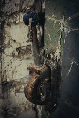 An abandoned switch for high-voltage in an old factory clipart