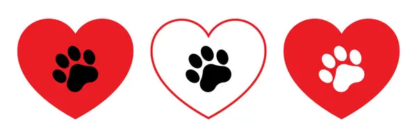 Pati izi vektör simgesi olan kırmızı kalp. Evcil hayvan aşk sembolü. Köpek ya da kedi pençe izi çizimi. Hayvan ayak izi..