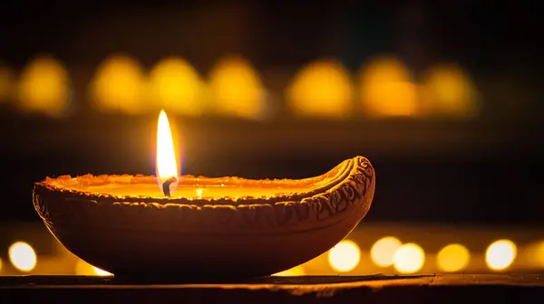 stock image Candles glowing with soft light creating a peaceful and joyful Diwali background. this image was created with artificial intelligence