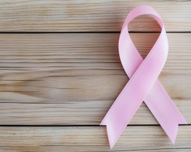 Ahşap arka planda pembe bir kurdele. Göğüs kanseri önleme kampanyası. Pembe Ekim. Yapay Zeka ile oluşturuldu