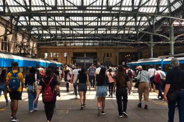 Buenos Aires, Argentina - November 27, 2024: people getting off the train at Constitucin station. clipart