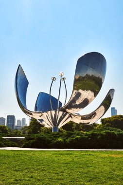 Buenos Aires, Argentina - November 27, 2024: The Floralis Genrica by artist Eduardo Catalano in Buenos Aires, Argentina. clipart