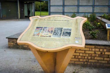 London, England, May 24 2023: The festival Pleasure Garden sign with history of the place clipart