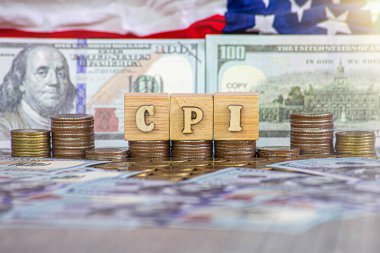 CPI, tüketici fiyat endeksi sembolü. Sözcüklerle tahta blok, dolar banknotlarında tüketici fiyat endeksi. İş ve CPI, tüketici fiyat endeksi kavramı.