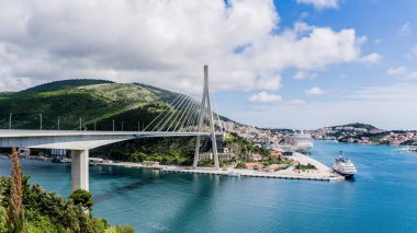 Dubrovnik, Croatia - May 2, 2014: Franjo Tudman Bridge spans the narrow channel that separates the old city from the mainland. It is named after Franjo Tudman, the first President of Croatia.