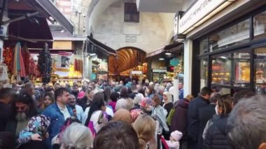 Istanbul, Turkey - July 2019: Crowds of people shopping in Eminonu district, historical center of Istanbul. It is known for its historical landmarks, such as the Grand Bazaar and the Blue Mosque