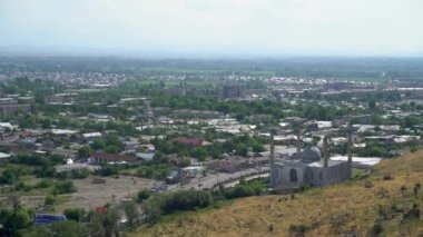 Osh, Kyrgyzstan - May 2022: Osh cityscape as seen from Suleiman mountain. Osh is the second largest city in Kyrgyzstan, located in the Fergana Valley in the south of the country