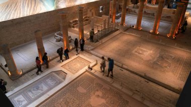 Gaziantep, Turkey - 18 October 2023: Tourists visiting Zeugma Mosaic Museum clipart