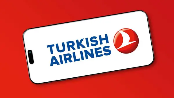 stock image Istanbul, Turkey - 02 July 2024: Turkish Airlines logo on a smartphone screen. Turkish Airlines is Turkey's national flag carrier airlines company