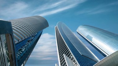 Abu Dabi, Birleşik Arap Emirlikleri - 14 Şubat 2022: Etihad Kuleleri kompleksi beş gökdelenden oluşuyor ve en yüksek bina 74 kata ulaşıyor. BAE başkentinin modern siluetindeki gösterişli kuleler.