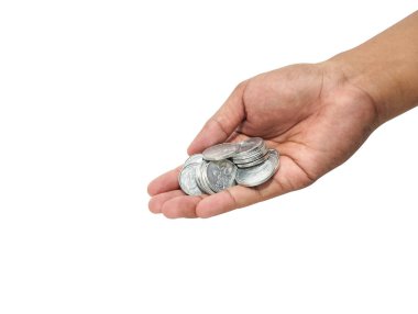 Endonezya sikkelerini tutan bir el resmi 
