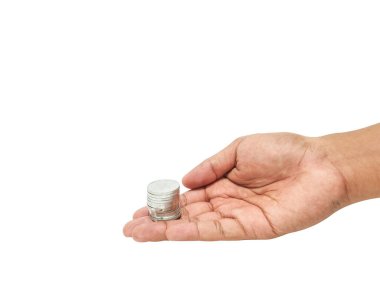 Endonezya sikkelerini tutan bir el resmi 