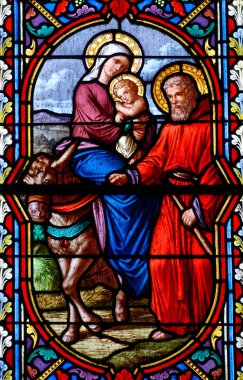 Dijon, FRANCE - 01-30-2025: Kutsal Aile 'nin lekeli camları (19. yüzyıl): Mısır' a Kaçış. 