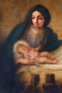 Napoli, İtalya - 10-24-2024: Bebek İsa 'yı kollarında tutan Bakire Meryem' in Tablosu.