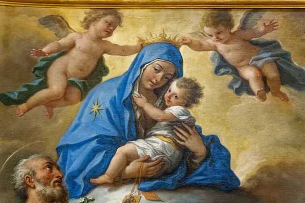 Anacapri, İtalya - 10-26-2024: Kutsal Bakire Meryem 'in 19. yüzyılda bebek İsa' yı kollarında tutan resmi. 