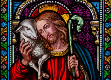 Aziz Nazaire les Eymes, FRANCE - 01-08-2025: İyi Çoban İsa 'nın lekeli camları (19. yüzyıl). 