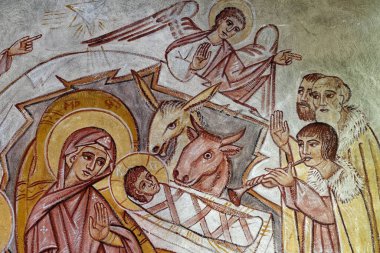 Saint Genest Lerpt, FRANCE - 07-13-2024: Noel Doğumu Sahnesi: Bebek İsa 'ya altın, tütsü ve mür hediyelerini sunan Magi' ye Tapma. 