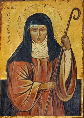Paris, FRANCE - 09-28-2024: Saint Colette veya Colette de Corbie ikonu. Fakir Clares 'in Fransız başrahibesi ve Roma Katolik Kilisesi' nin azizi.. 