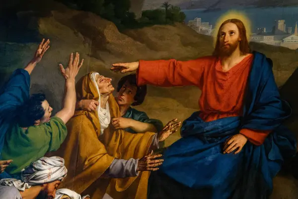Paris, FRANCE - 09-15-2024: Hasta ve yaralıları iyileştiren İsa Mesih 'in resmi. İncil 'in mucizeleri.