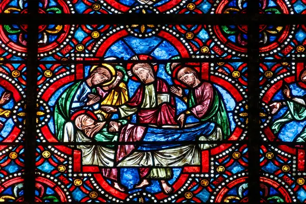 Auxerre, FRANCE - 10-16-2024: İsa 'nın mucizelerinin lekeli camı (17. yüzyıl): Jairus' un kızının dirilişi. 