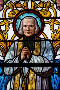 Marcellaz, Fransa - 03-28-2025: Aziz John Mary Vianney veya Aziz Jean-Marie Vianney 'in lekeli camları (1930), ayrıca Kutsal Cure d' Ars olarak da bilinir. Katolik Kilisesi 'nin azizi..