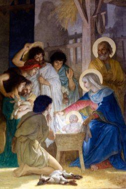 Paris, FRANCE - 07-07-2024: Bakire Meryem, Aziz Joseph ve İsa 'nın bebeğiyle Noel İsa' nın doğum sahnesinin (19. yüzyıl) resmi.