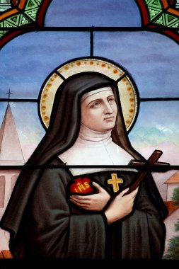 Cenevre, SUISSE - 05-30-2024: St. Jane Frances de Chantal veya Saint Jeanne de Chantal 'ın lekeli camları (19. yüzyıl). Kutsal Meryem 'i Ziyaret Tarikatı' nın kurucusu.).