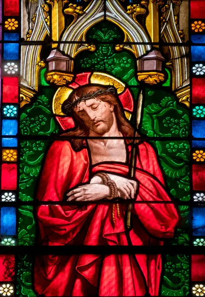 Miradoux, Fransa - 05-01-2025: İsa 'nın Tutkusu' nun lekeli camları (19. yüzyıl): İsa 'nın aşağılanması veya alay edilmesi.