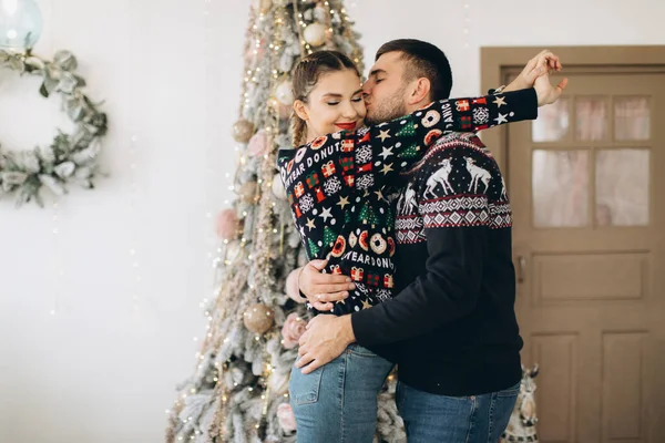 Happy Couple Traditional Sweater Decorating Christmas Tree Together Home — Stock Photo, Image
