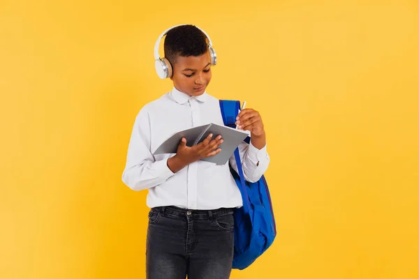 Happy Mixed Race Schoolboy Wearing Headphones Backpack Holding Books Notebooks — Stock Photo, Image