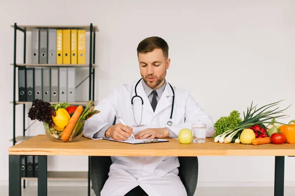Happy Doctor Nutritionist Sitting Workplace Desk Office Fresh Vegetables Diet — Stock Photo, Image