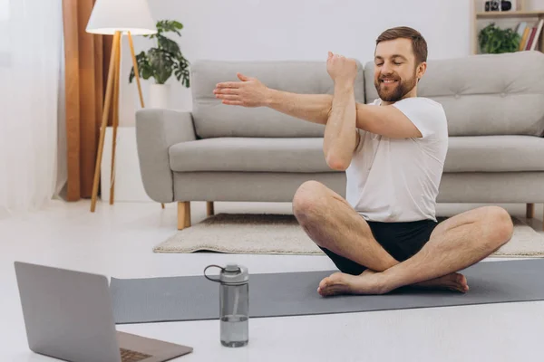 Handsome Bearded Man Doing Hamstring Stretch Exercise Home — Stock Photo, Image