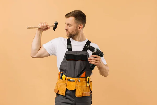 Positive Male Repairman Home Tools Beige Background — Stock Photo, Image