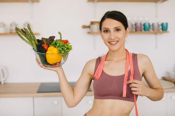 Portrait Happy Sporty Woman Holding Plate Fresh Vegetables Kitchen — Stock Photo, Image