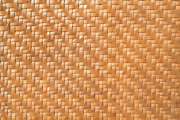 traditional thai style rattan pattern light orange color made from bamboo handcraft weave texture wicker surface for furniture material